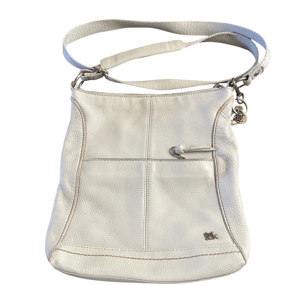 The Sak Crossbody Bag Womens Medium Light Gray Leather Silver Logo Lucia